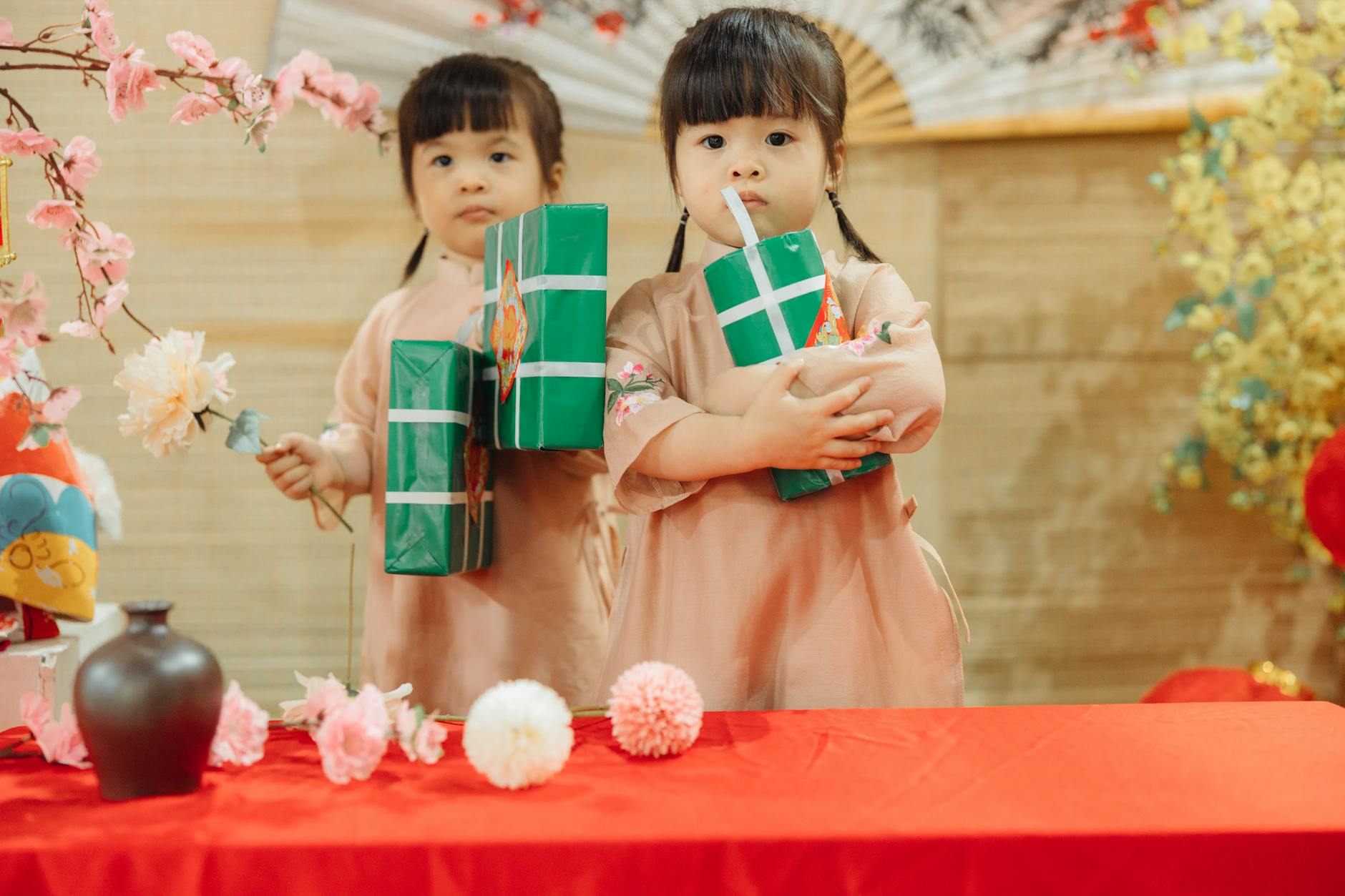 Children holding festive gifts